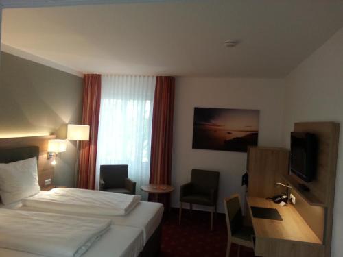 Imagen de la habitación del Hotel Novostar. Foto 7