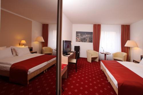 Imagen de la habitación del Hotel Novostar. Foto 10