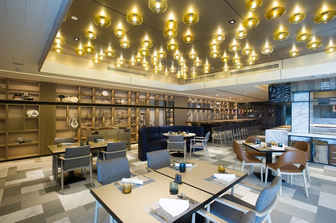 Imagen del bar/restaurante del Hotel Novotel Bangkok Sukhumvit 20. Foto 11