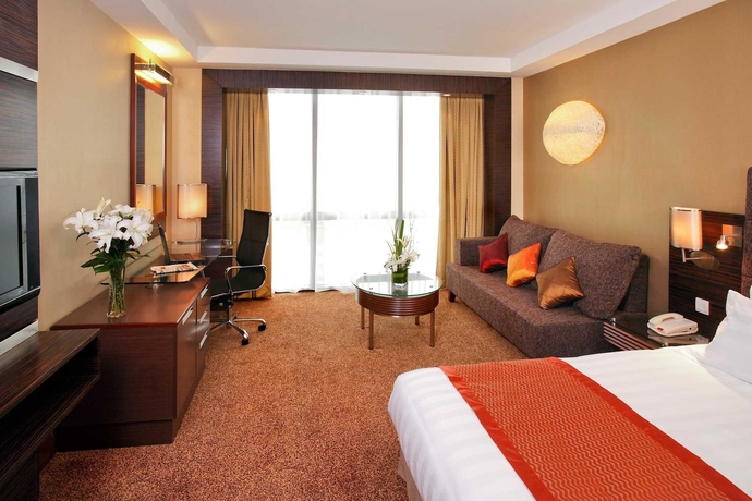 Imagen de la habitación del Hotel Novotel Beijing Peace. Foto 10