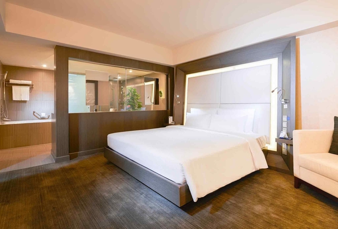 Imagen de la habitación del Hotel Novotel Beijing Sanyuan. Foto 13