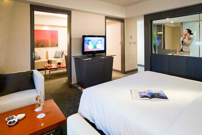Imagen de la habitación del Hotel Novotel Beijing Sanyuan. Foto 14
