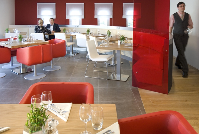 Imagen del bar/restaurante del Hotel Novotel Brussels Airport. Foto 3