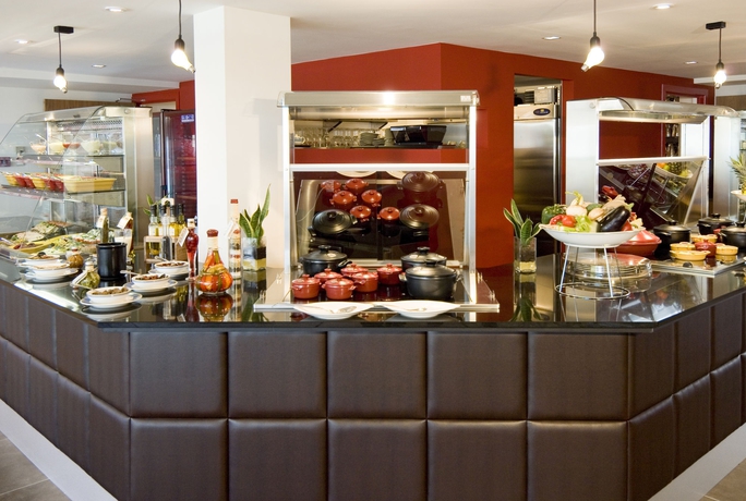 Imagen del bar/restaurante del Hotel Novotel Brussels Airport. Foto 4