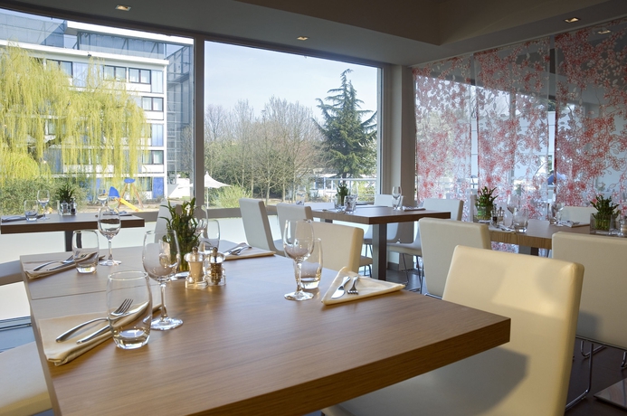 Imagen del bar/restaurante del Hotel Novotel Brussels Airport. Foto 7