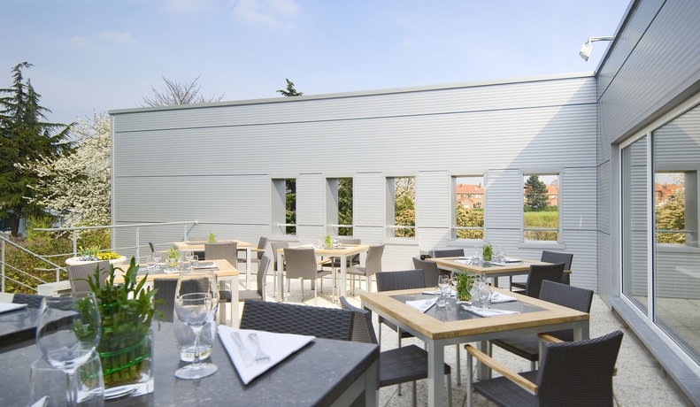 Imagen del bar/restaurante del Hotel Novotel Brussels Airport. Foto 9