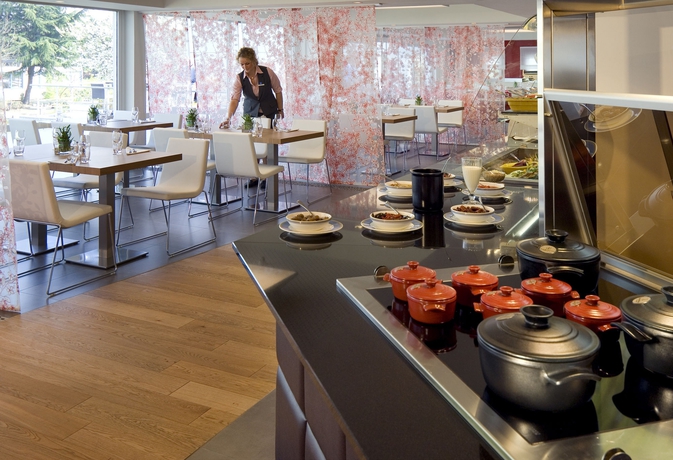 Imagen del bar/restaurante del Hotel Novotel Brussels Airport. Foto 10