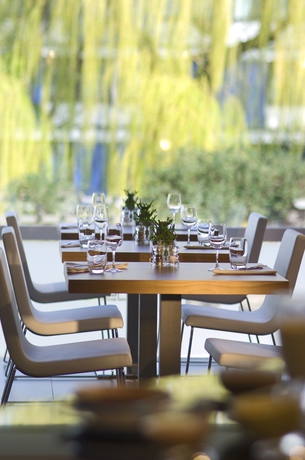 Imagen del bar/restaurante del Hotel Novotel Brussels Airport. Foto 11