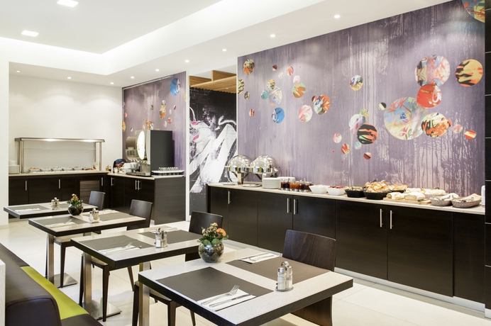 Imagen del bar/restaurante del Hotel Novotel Brussels Centre Midi Station. Foto 7