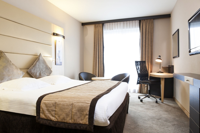 Imagen de la habitación del Hotel Novotel Brussels Centre Midi Station. Foto 11