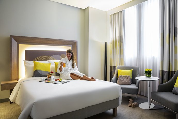 Imagen de la habitación del Hotel Novotel Bur Dubai. Foto 4