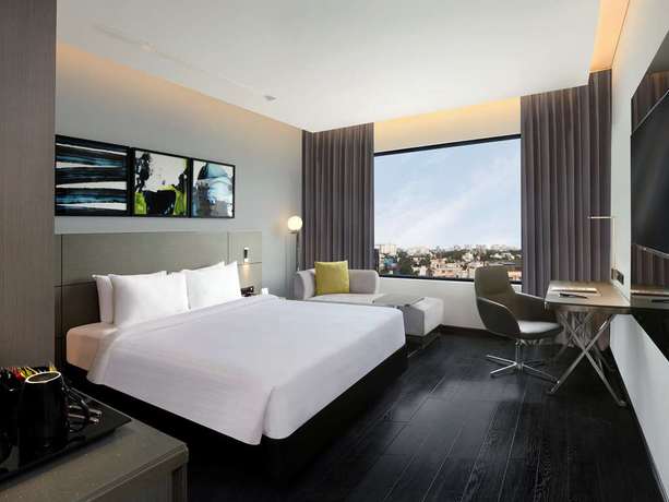 Imagen de la habitación del Hotel Novotel Chennai Chamiers Road. Foto 4