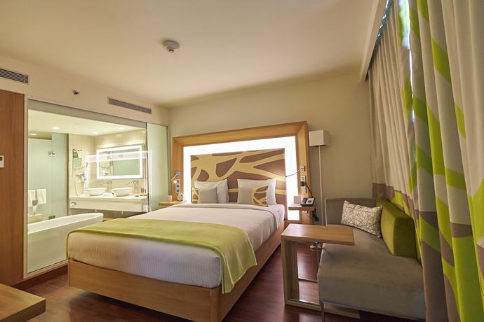 Imagen de la habitación del Hotel Novotel Chennai Omr. Foto 7