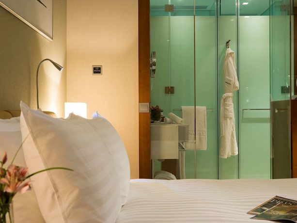 Imagen de la habitación del Hotel Novotel Citygate Hong Kong. Foto 8