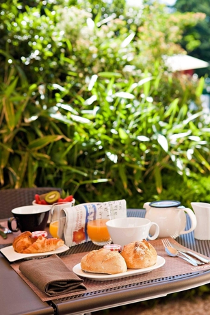 Imagen del bar/restaurante del Hotel Novotel Clermont-Ferrand. Foto 5