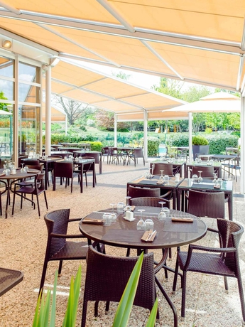 Imagen del bar/restaurante del Hotel Novotel Clermont-Ferrand. Foto 8