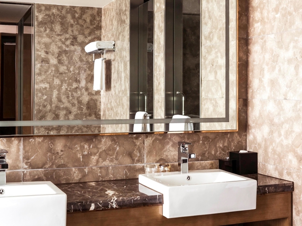 Imagen de la habitación del Hotel Novotel Daqing Haofang. Foto 12