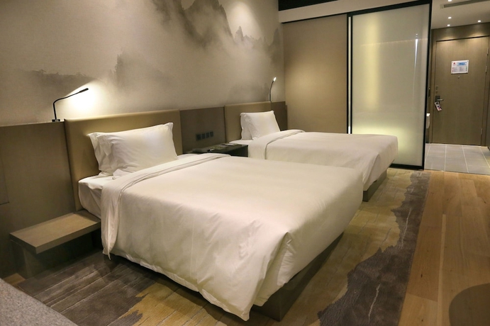 Imagen de la habitación del Hotel Novotel Deqing Moganshan. Foto 5