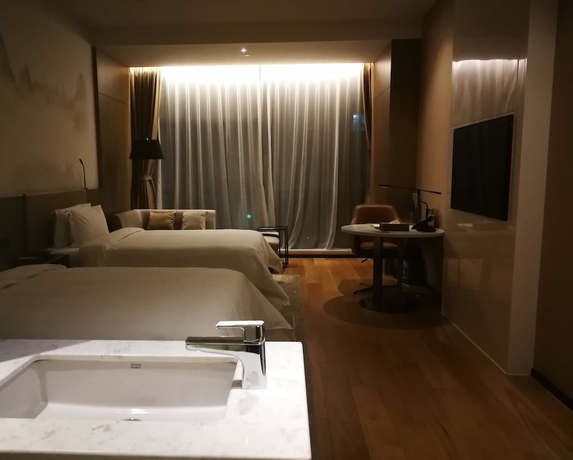Imagen de la habitación del Hotel Novotel Deqing Moganshan. Foto 15
