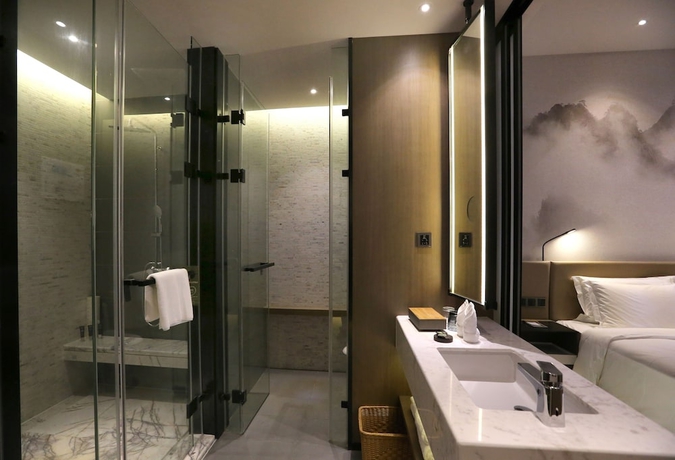 Imagen de la habitación del Hotel Novotel Deqing Moganshan. Foto 18