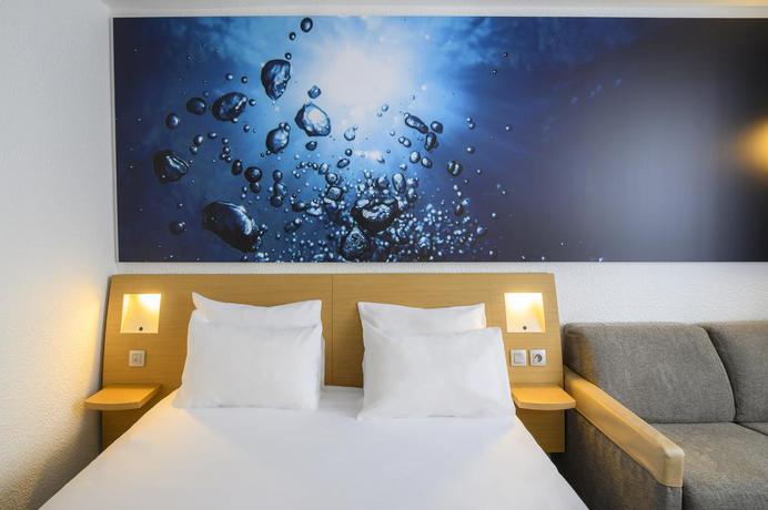 Imagen de la habitación del Hotel Novotel Dijon Sud. Foto 14