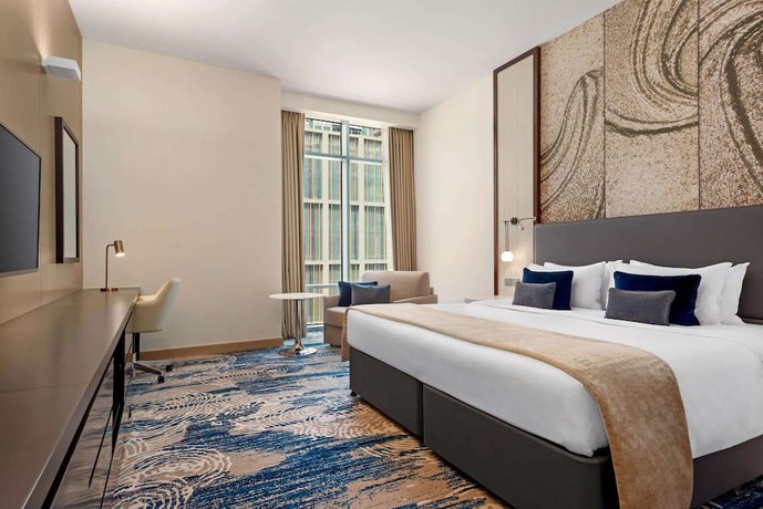 Imagen de la habitación del Hotel Novotel Dubai Gold District. Foto 7