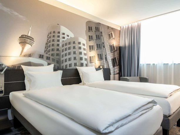 Imagen de la habitación del Hotel Novotel Duesseldorf Airport. Foto 18