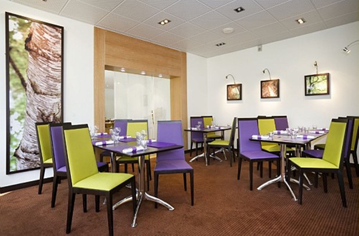 Imagen del bar/restaurante del Hotel Novotel Geneve Aeroport. Foto 9