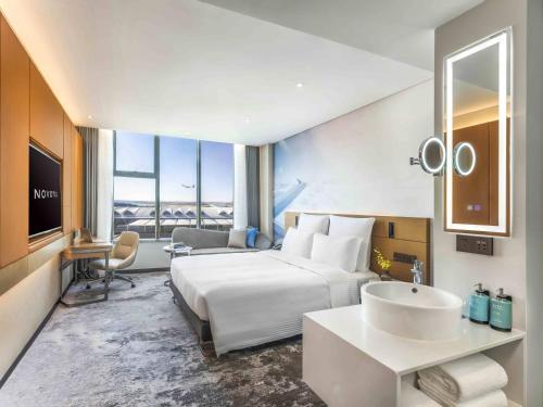 Imagen de la habitación del Hotel Novotel Guangzhou Baiyun Airport. Foto 9
