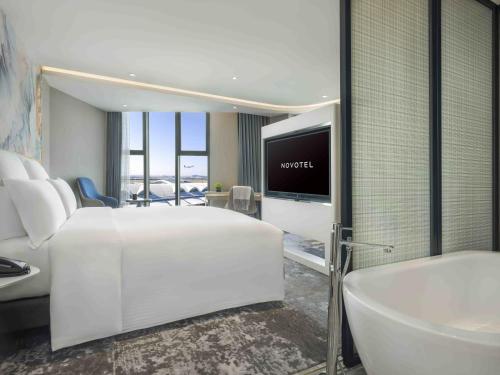 Imagen de la habitación del Hotel Novotel Guangzhou Baiyun Airport. Foto 11