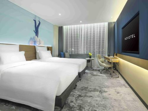 Imagen de la habitación del Hotel Novotel Guangzhou Baiyun Airport. Foto 12
