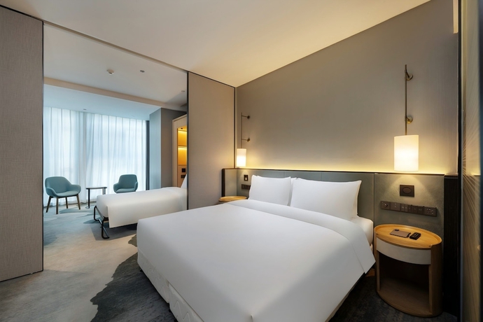 Imagen de la habitación del Hotel Novotel Haikou West Coast. Foto 1