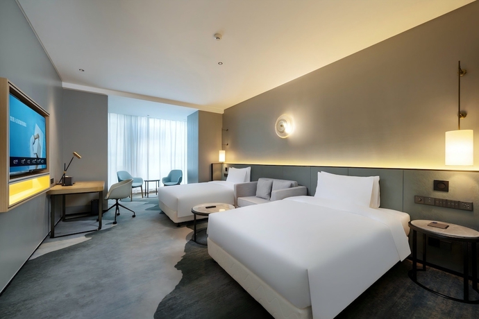 Imagen de la habitación del Hotel Novotel Haikou West Coast. Foto 3