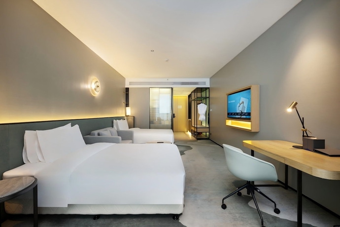 Imagen de la habitación del Hotel Novotel Haikou West Coast. Foto 4