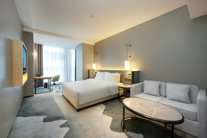 Imagen de la habitación del Hotel Novotel Haikou West Coast. Foto 5