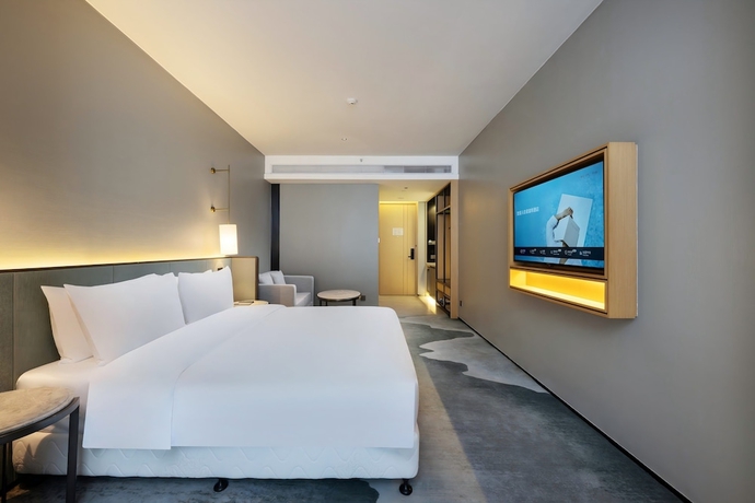 Imagen de la habitación del Hotel Novotel Haikou West Coast. Foto 6
