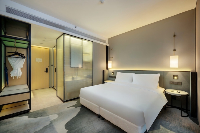 Imagen de la habitación del Hotel Novotel Haikou West Coast. Foto 7