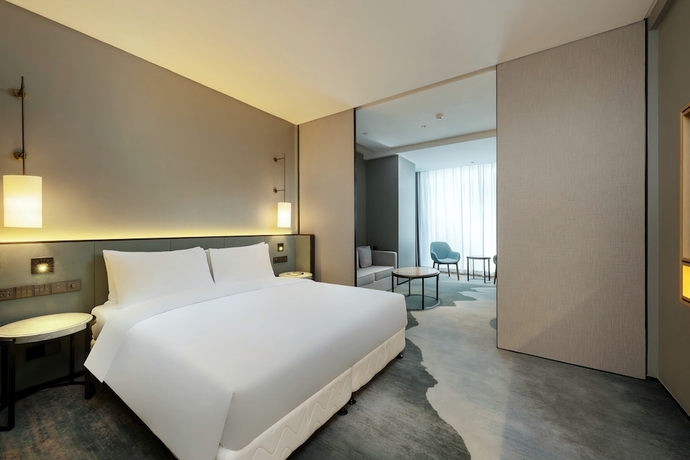 Imagen de la habitación del Hotel Novotel Haikou West Coast. Foto 8