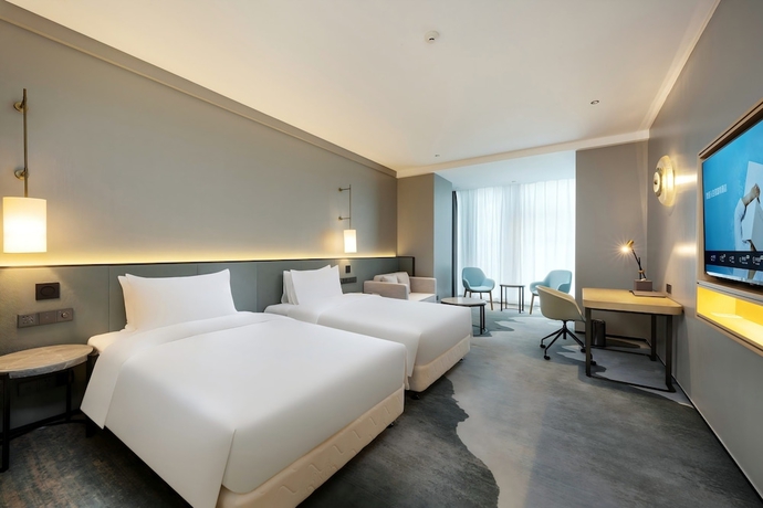 Imagen de la habitación del Hotel Novotel Haikou West Coast. Foto 10
