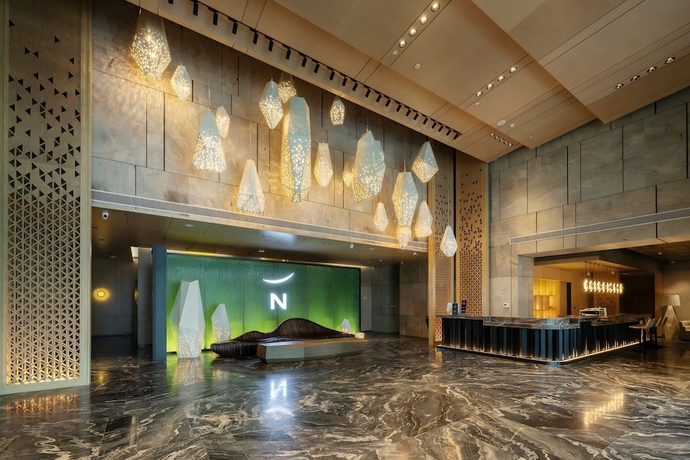 Imagen de los interiores del Hotel Novotel Haikou West Coast. Foto 16