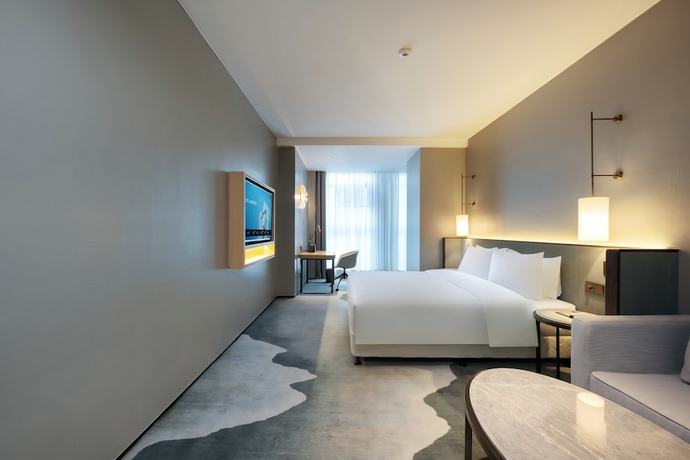 Imagen de la habitación del Hotel Novotel Haikou West Coast. Foto 13
