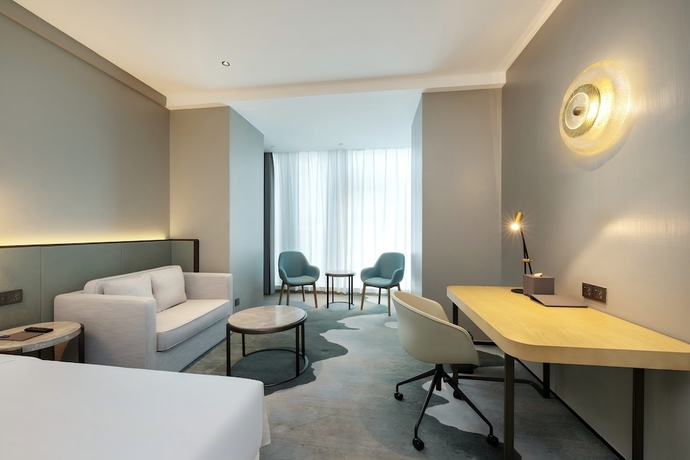 Imagen de la habitación del Hotel Novotel Haikou West Coast. Foto 14