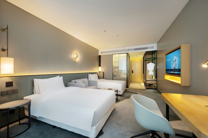 Imagen de la habitación del Hotel Novotel Haikou West Coast. Foto 15