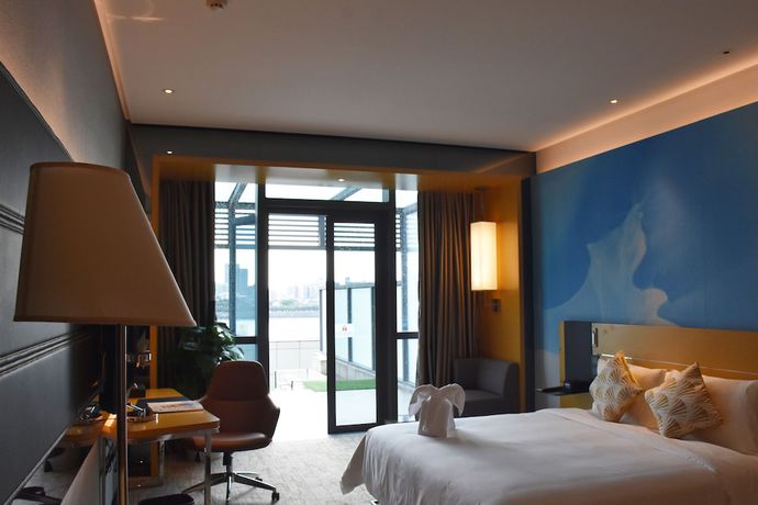 Imagen de la habitación del Hotel Novotel Haikou Xinbudao. Foto 9