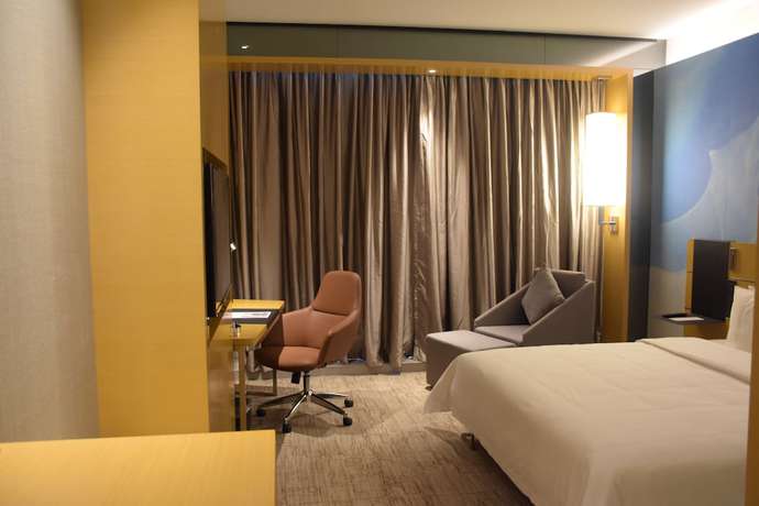 Imagen de la habitación del Hotel Novotel Haikou Xinbudao. Foto 11