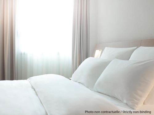 Imagen de la habitación del Hotel Novotel Hamburg Central Station. Foto 17