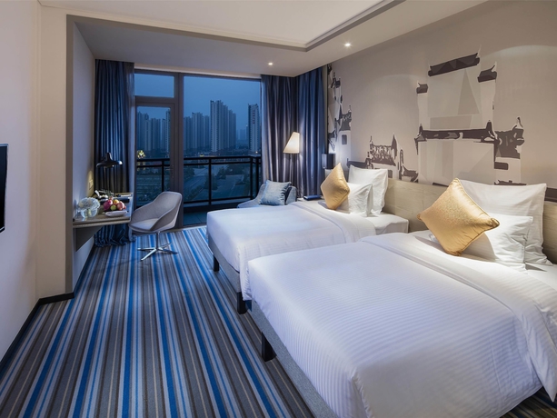 Imagen de la habitación del Hotel Novotel Hefei Sunac. Foto 11