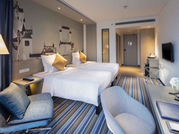 Imagen de la habitación del Hotel Novotel Hefei Sunac. Foto 12