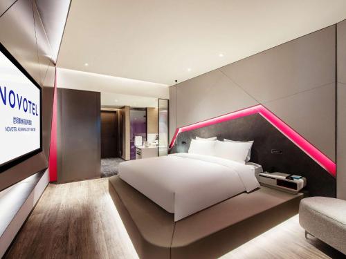 Imagen de la habitación del Hotel Novotel Kunming City Center. Foto 12