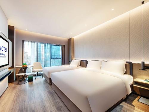 Imagen de la habitación del Hotel Novotel Kunming City Center. Foto 14